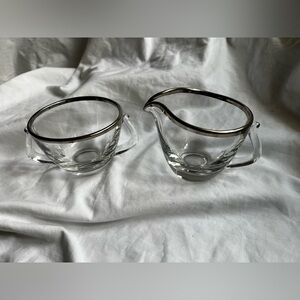 vintage Fostoria Contour clear glass creamer and sugar set with a silver rim.
